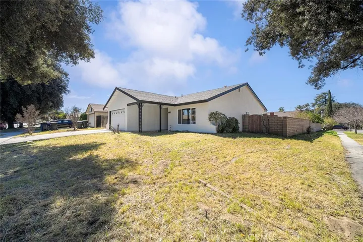 Corner lot with newly painted updated home.
