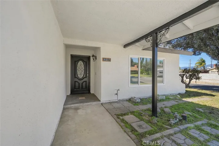 Spacious covered front for guests to be greeted and protected from the elements whether rain or shine.