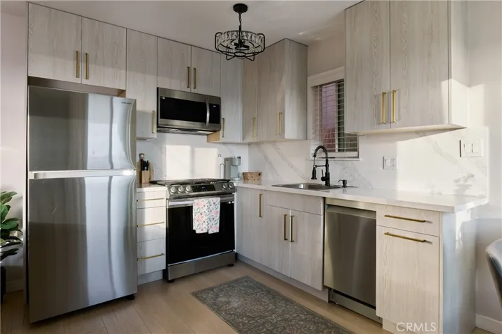 beautifully remodeled kitchen with stainless steel appliances