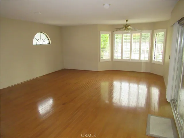 Enlarged Family Room with access to covered patio and rear yard for entertaining