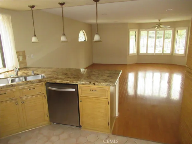 Kitchen Countertop dining, Informal dining area & enlarged family room with bay window.
