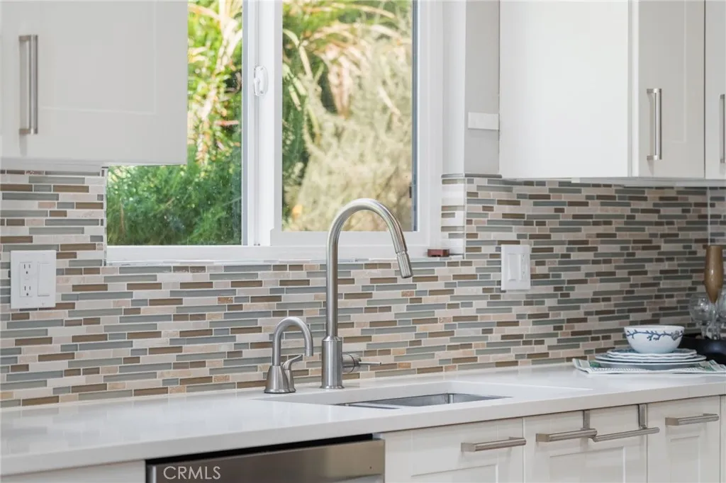 Stainless steel sink and fixtures.