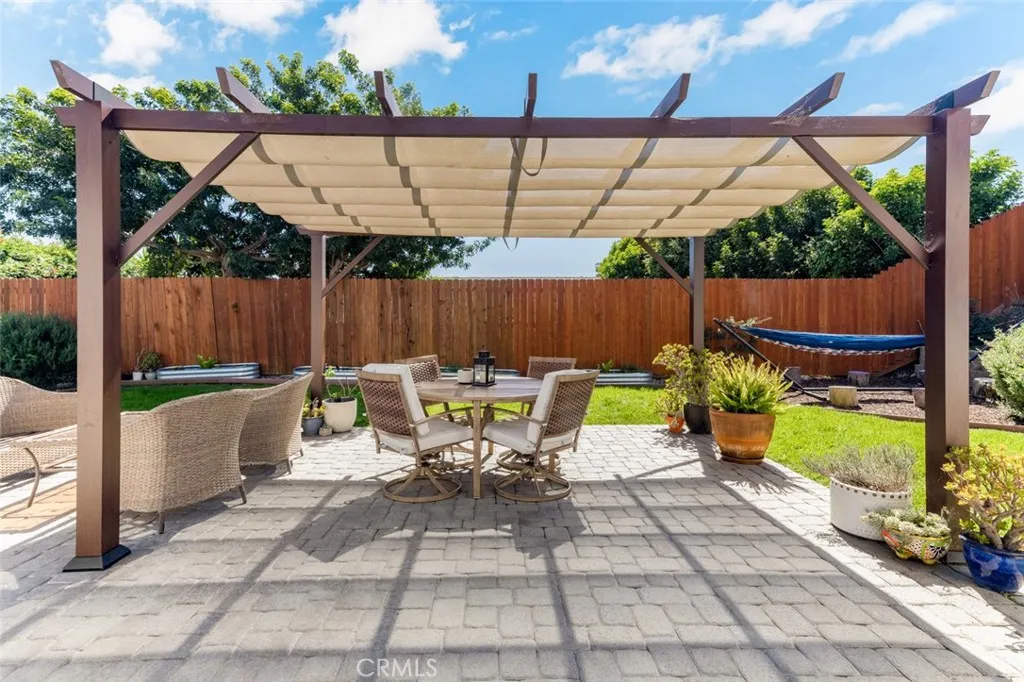Close up of pergola covered. And if too hot, new A/C installed in 2025 will cool you off!