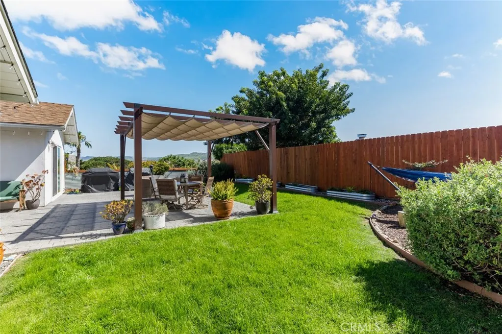 Past the patio is the beautiful pergola for the wonderful warm evenings and give you the view of the easterly mountains.