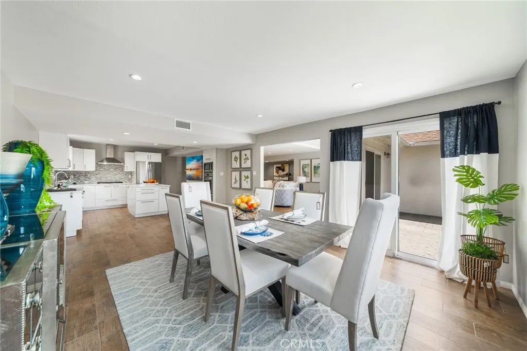 Dining area can handle very long tables for entertainment. Also sliding glass door creates easy access to outdoor Grill.