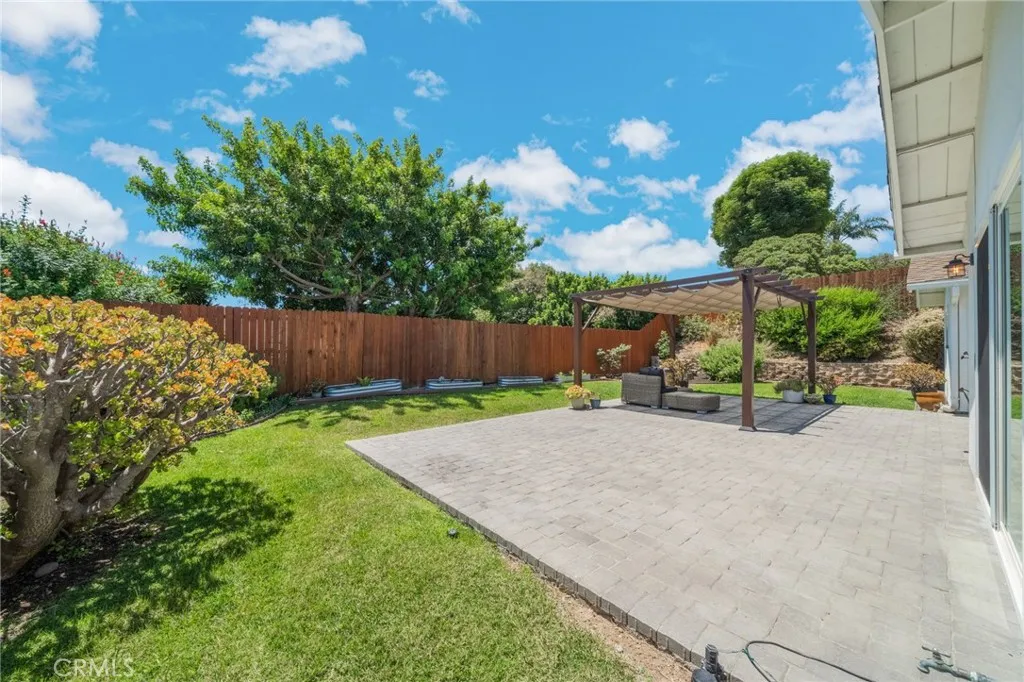 Looking southwest. All silver planters along fence are included. The owner's wife is a botanist and most of the plantings are native to CA so less watering!