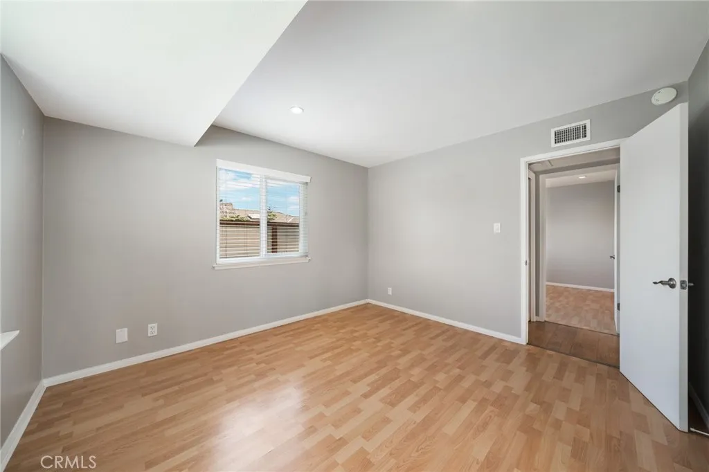 Bedroom 2 has privacy to the east. Between the bedrooms in the hallway is a Linen closet.