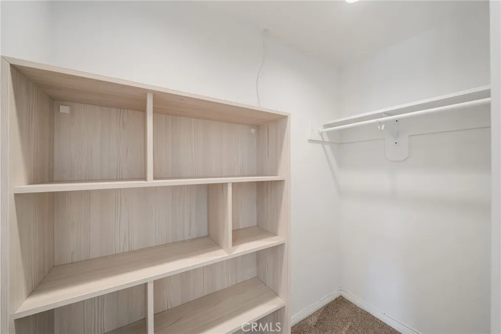 One of two closets in Primary Bedroom.