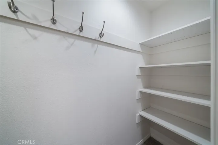 Right end of Front hall closet.