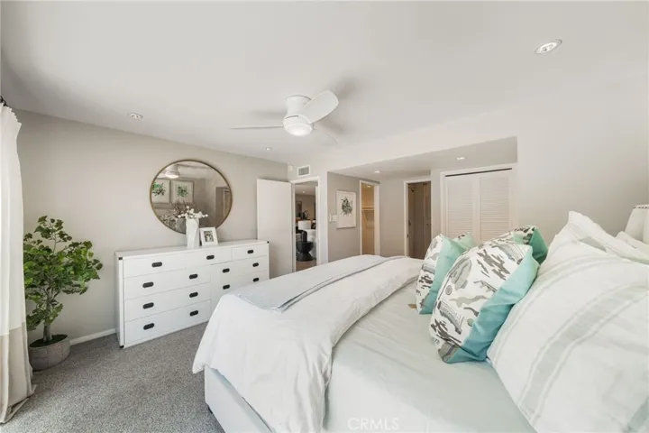 Large Primary Bedroom is at back of the Home. King size bed fits easily.