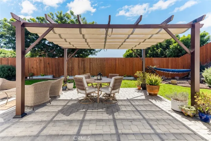 Close up of pergola covered. And if too hot, new A/C installed in 2025 will cool you off!