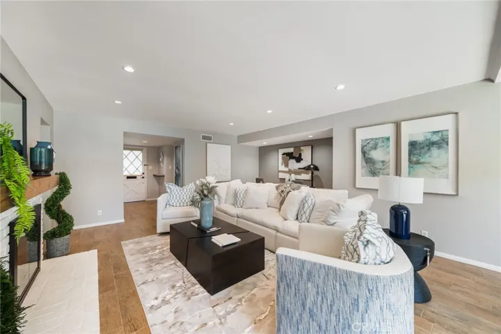 Very large and comfortable Main room is the center of the home. A large gas fireplace provides a warm ambiance  for family & friend conversations or for movies & TV watching.