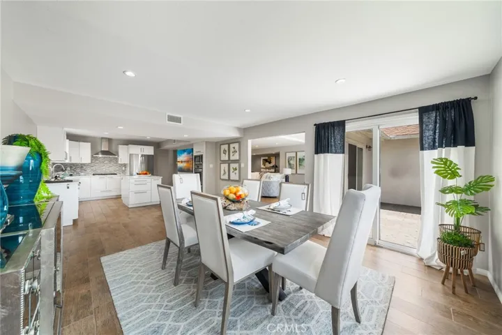 Dining area can handle very long tables for entertainment. Also sliding glass door creates easy access to outdoor Grill.