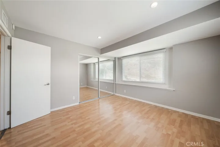 Bedroom 2. A beautiful window seat that looks to front yard opens this room up. A large closet. Room for a Queen size bed.