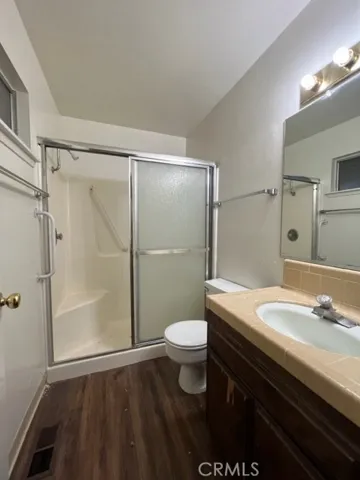 UNIT A - Primary Bathroom -Property is currently occupied - Photos are from vacancy prior to this tenant