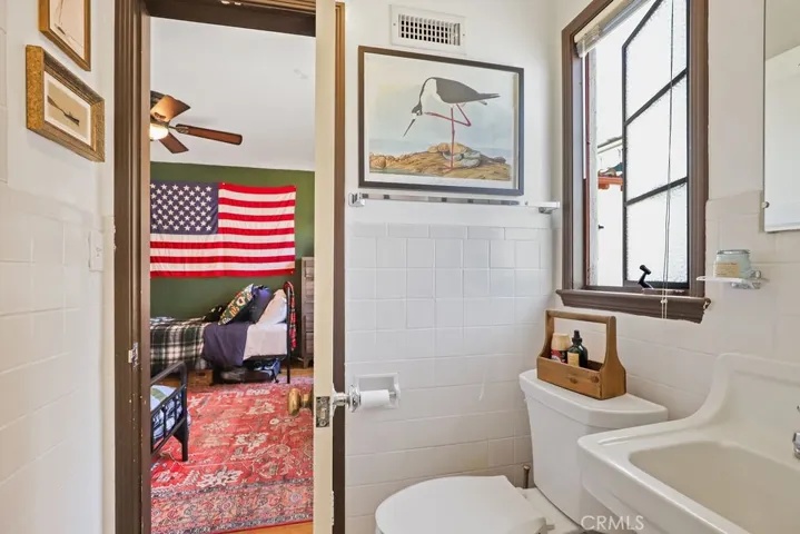 Bathroom off laundry and bedroom
