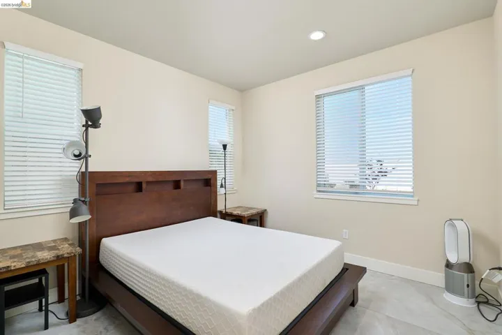 Bedroom with baseboards and recessed lighting