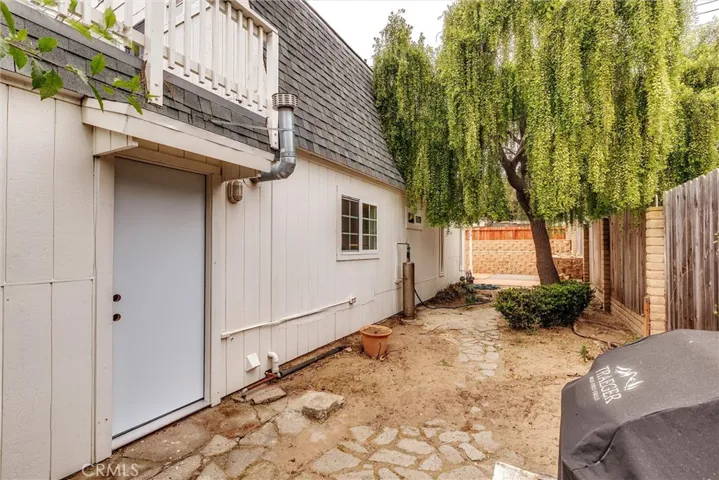 backyard with door to garage.