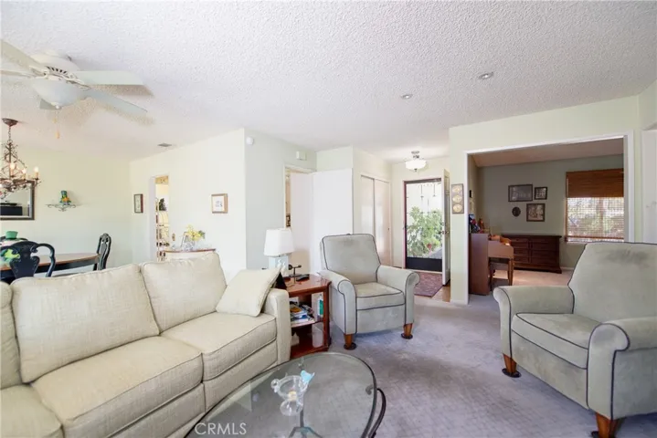 Living room looking towards the office/den convertible to a 3rd bedroom.