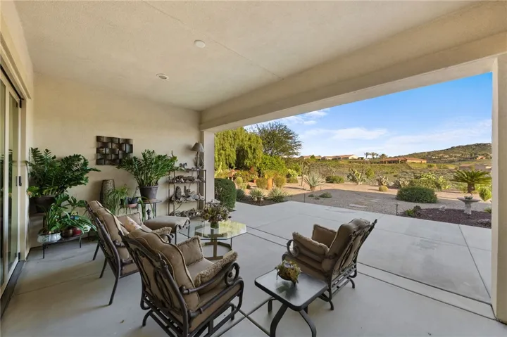 This California room offers abundant natural light, flexible gathering areas, and backyard access.