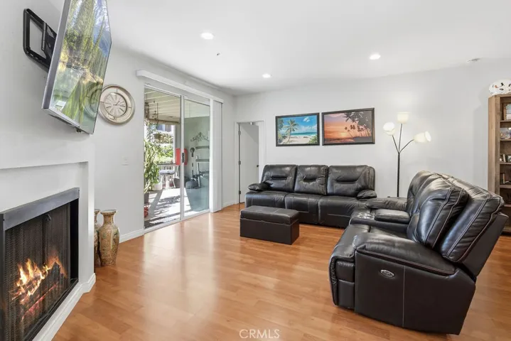 light and bright living room with fireplace