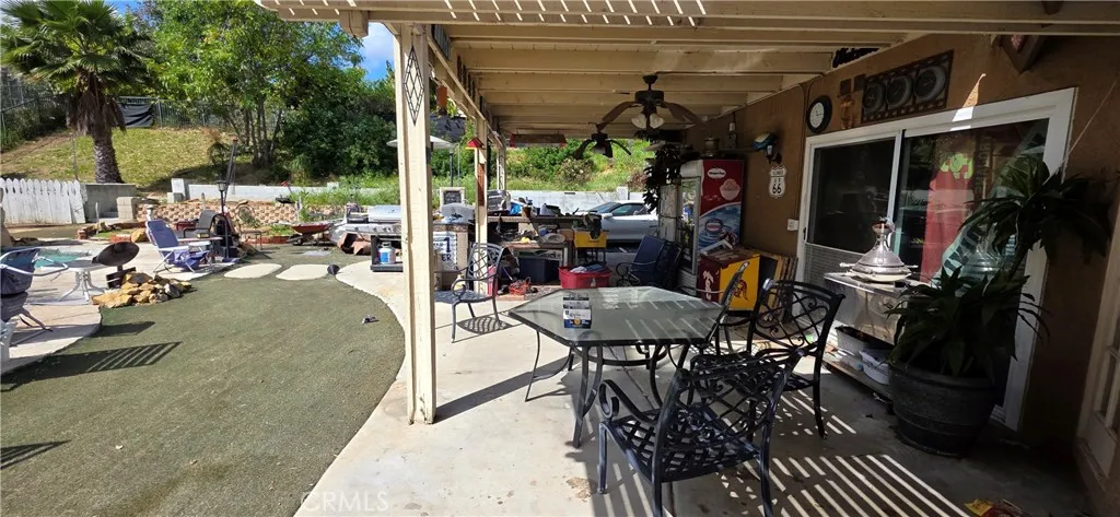 Covered patio.  Excuse the clutter!