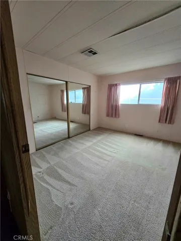 Primary bedroom with large closet.