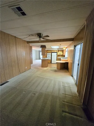 Family room looking into kitchen.