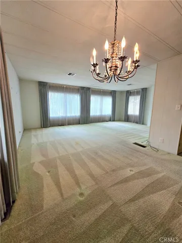 Formal dining room looking into living room.