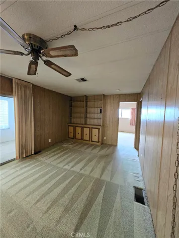 Family room with built in hutch.