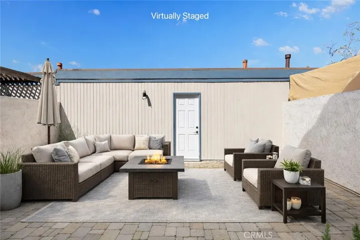 Rear enclosed Patio - Virtually Staged