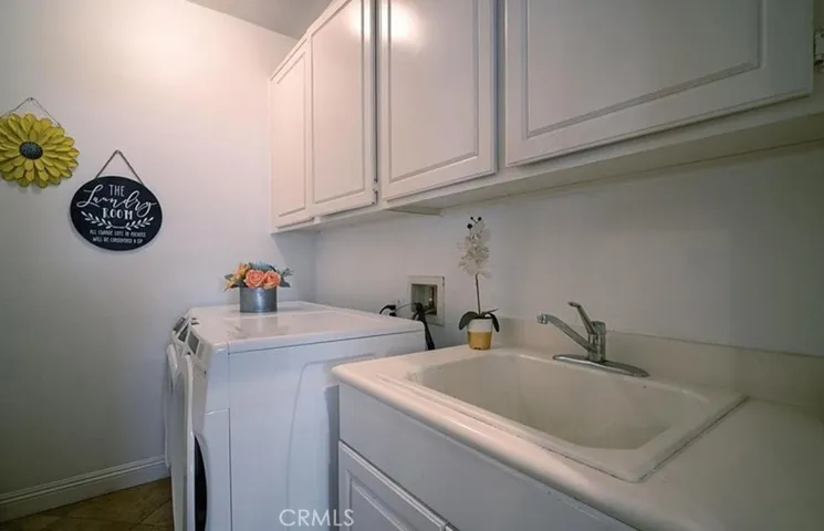 Laundry Room off of Kitchen with Utility Sink