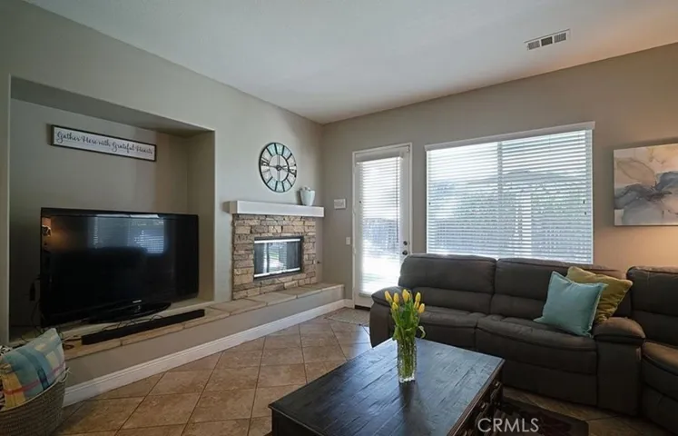 Cozy Family Room with Direct Access To Patio