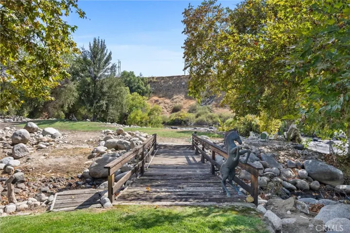 Bridge going over stream to river