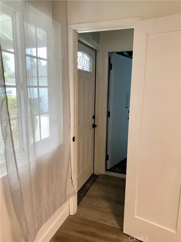 kitchen door leads to stairs, separate exterior entrance, and direct garage entrance