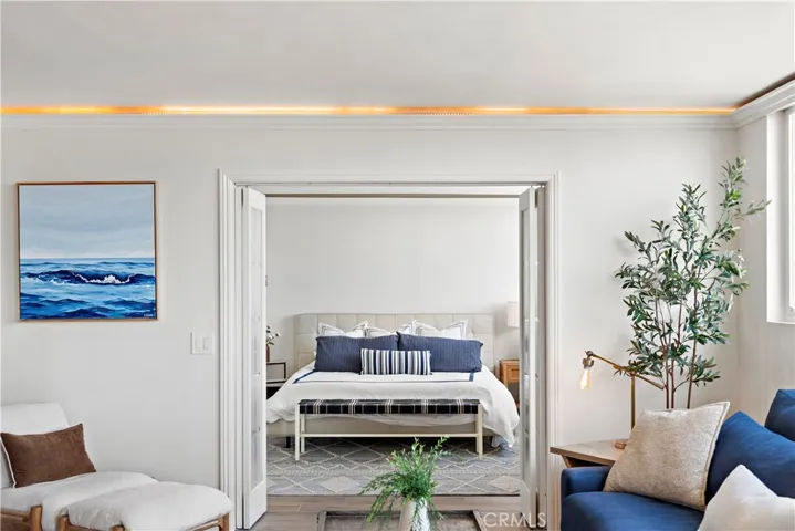 Enter the primary through elegant French doors