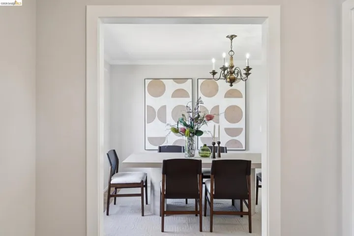 Dining space featuring suspended lighting