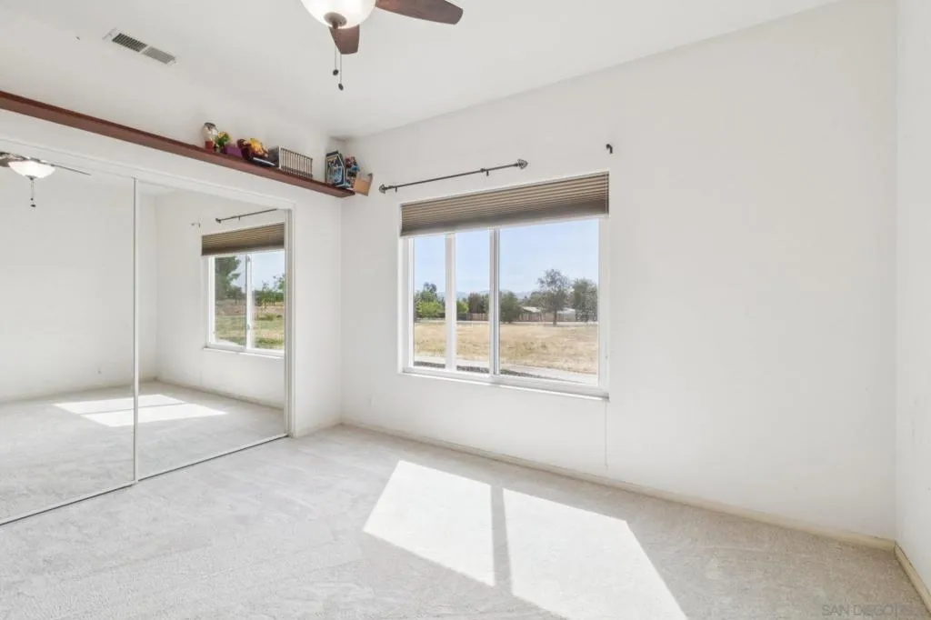 Bedroom 1, next to full guest bathroom,   homes with large bedrooms are in this home in Ramona