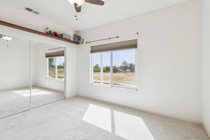Bedroom 1, next to full guest bathroom,   homes with large bedrooms are in this home in Ramona