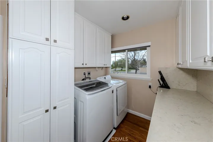 Laundry Room Lots of Cabinets and Counter Space