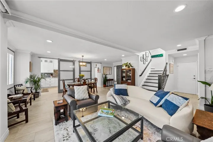 Wide open living room with room for your mix of furniture and dining concept. View from sliding door to patio.