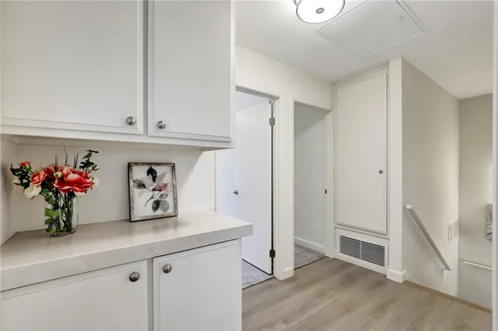 Upstairs Landing, Linen Cabinetry, & Counter
