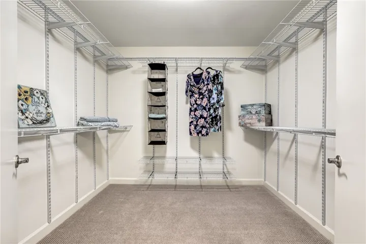 Primary Bedroom walk-in Closet - pic 2