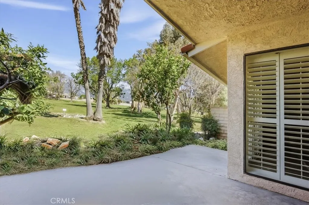 Private patio with golf course and mountain views.