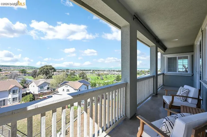 Balcony featuring a residential view