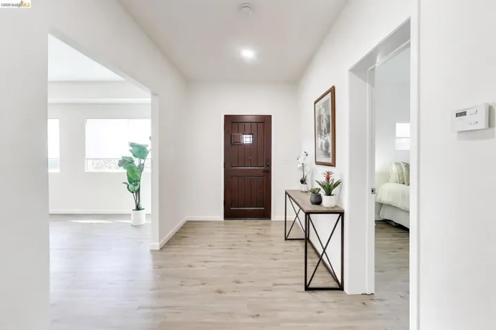 Entryway featuring light wood finished floors and baseboards