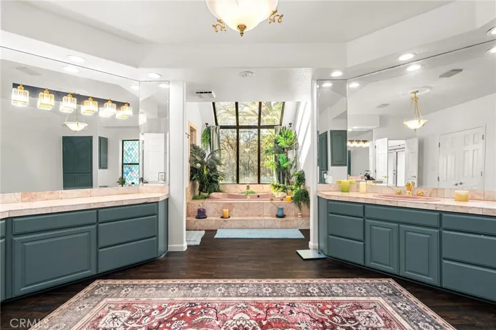 Expansive ensuite bathroom, with large tub and walk in shower