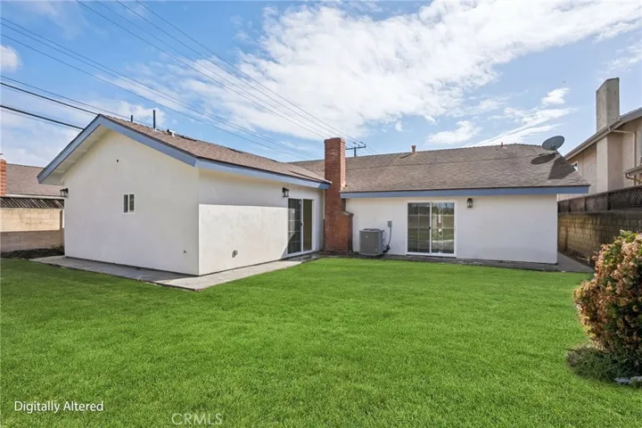 Backyard with artificial grass view #1