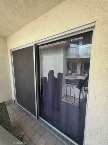 Primary slider door to balcony