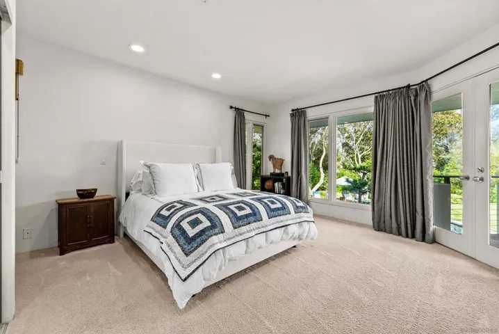 Each guest bedroom has an en suite bathroom.  This bedroom has a queen size bed